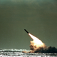 The U.S. Navy successfully launches a Trident II, D-5, Performance Evaluation Missile from the submerged submarine USS Tennessee in this 1989 file photo. The missile was launched despite attempts by the Greenpeace organization to stop the operation. (AP Photo/Phil Sandlin)